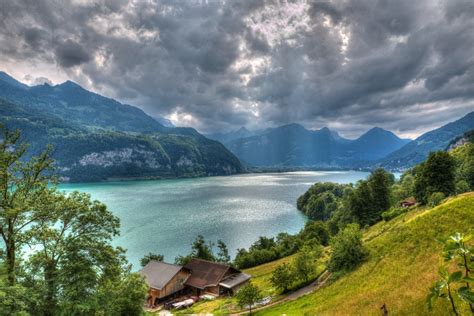 Lake Walensee Alps Switzerland Lake Mountain House Tree Clouds Hd Wallpaper