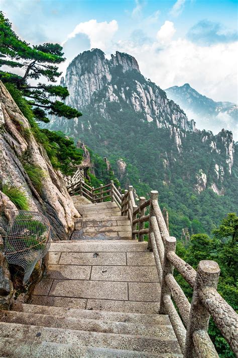 Stairs Leading Up To The Top Of A Mountain