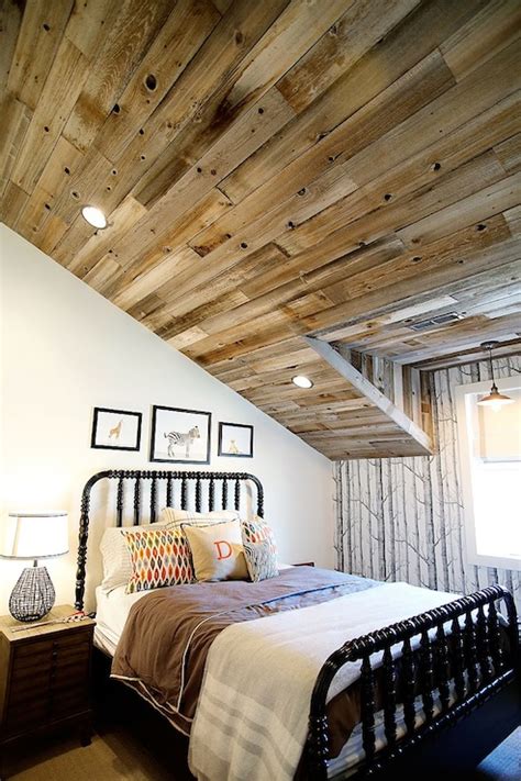While sloped ceilings may make your bedroom seem smaller, they also add unique character to the space. Bedroom Sloped Ceiling Design Ideas