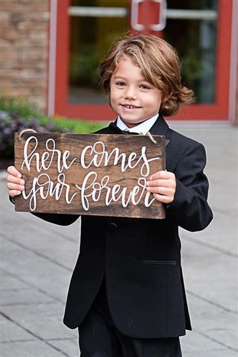 create the perfect sign for your ring bear to announce your enterance downt the aisle the