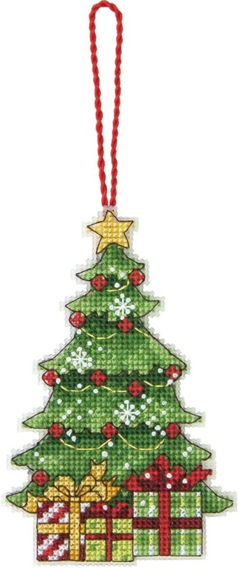 a cross stitch christmas tree ornament hanging from a red ribbon on a white background
