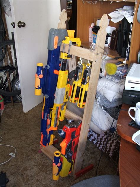 .squirt guns, nerf guns, rubber band guns, fake laser guns that made noise, whatever kind of gun best heavily modified nerf guns (and other toy gun mods) that we have found across the interwebs! Nerf Gun Rack | The rack has storage for most types of ...