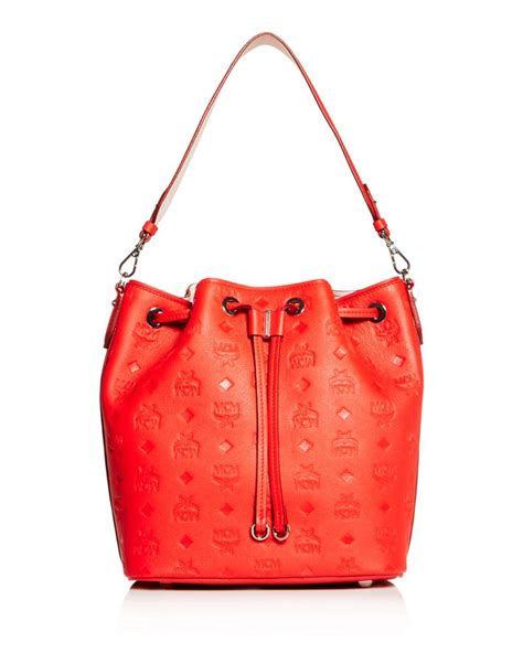 Mcm Essential Embossed Leather Bucket Bag In Red Lyst