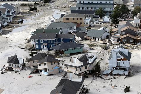 Photo special: Obama's aerial view of Sandy's trail of ruin | Herald Sun