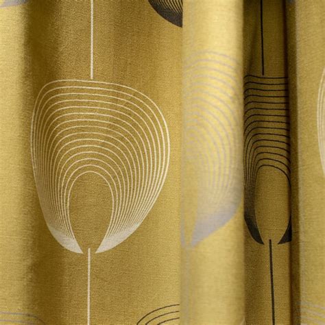 Delta Geometric Floral Fully Lined Eyelet Curtains Ochre