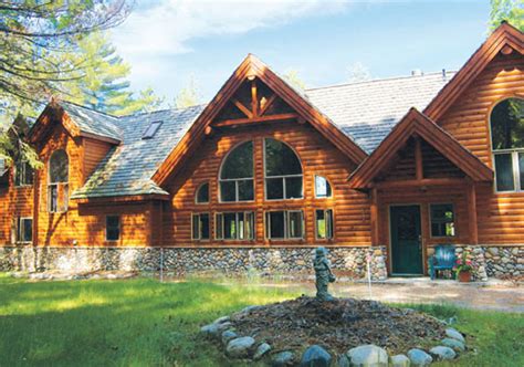 One of the most popular styles, a post and beam log home uses full logs as a structural support providing a natural log surface inside and outside the home. House Plans The Minden - Cedar Homes