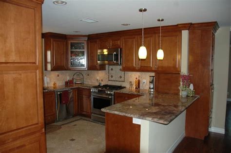 Take the time to install the kitchen floor everywhere except under the cabinets. Kitchen gutted and remodeled. Cabinets replace, granite countertops, gas range, Tile floors ...