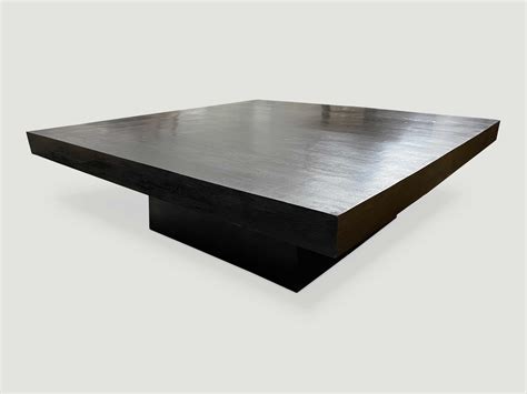 Handmade in indonesia using abaca, a sustainable material derived from banana leaves, this intricate coffee table combines contemporary style with natural, organic elements. Minimalist Black Coffee Table G78K - Andrianna Shamaris