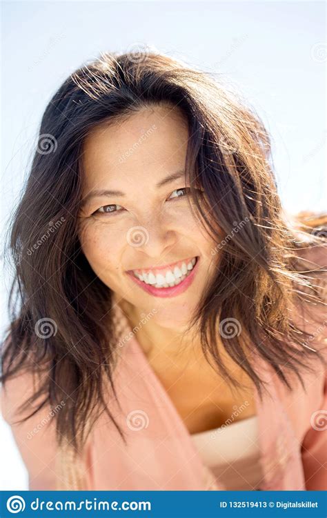 Portrait Of A Beautiful Asian Woman Smiling Stock Image Image Of Comfortable People 132519413