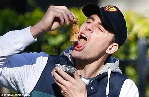 Former Afl Player Matthew Richardson Shovels Food Into His Mouth As His