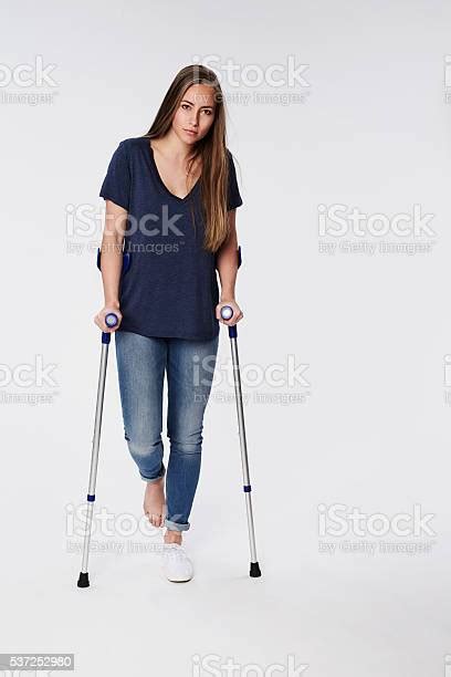 Beautiful Woman On Crutches Portrait Stock Photo Download Image Now