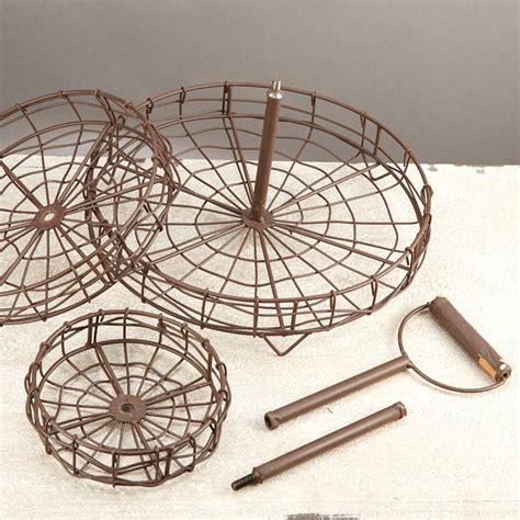 Each basket has handles for easy carrying. Rustic 3-Tier Wire Basket Stand - Baskets, Buckets ...