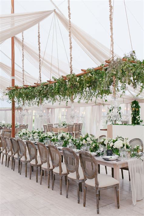 5 ways greenery can step up your wedding design hanging wedding decorations marquee wedding
