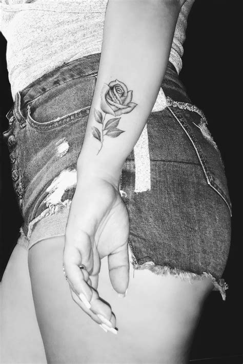 It could be your parents', friends', or someone you may have lost. Rose tattoo | Rose stem tattoo, Tattoos, Rose tattoo with name