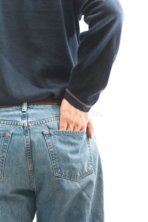 Homem Com Sua Mão No Bolso Traseiro Foto de Stock Imagem de azul