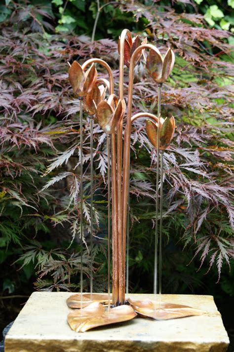 Decorative copper color resin duck figurine for pond decoration and garden ornaments. Copper Cyclamen Fountain water feature from Metallic Garden Furniture & Ornaments