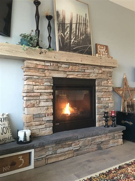 Rustic Stone Fireplace With Asymmetric Mantel And Hearth Fireplace