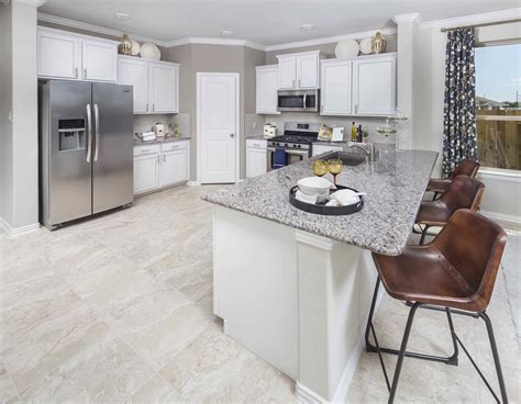 A Neutral and Bright Kitchen by Lennar Homes in Lakes of Savannah