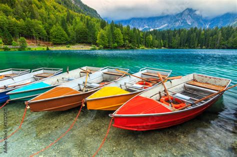 Stunning Alpine Landscape And Colorful Boatslake Fusineitaly Stock