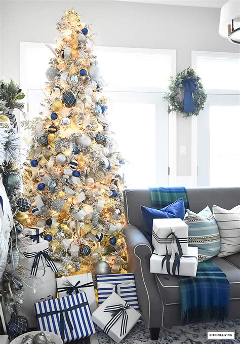 From classic to minimalist — and even to disney — these christmas tree themes will impress every holiday guest. Flocked Christmas Tree Decor: Blue, Silver + Gold ...