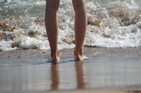 Free Images Beach Sea Sand Sunlight Wave Leg Spring Season Waves Beauty Feet In The