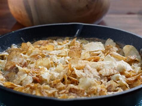 Golden cheddar bakes atop chicken, rice and water chestnuts in a smooth, mild sauce. Tuna Noodle Casserole with Potato Chip Topping Recipe ...