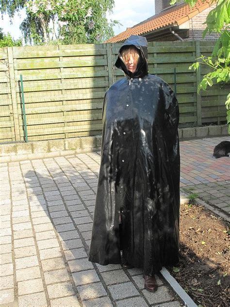 black rubber hooded cape rain wear vinyl raincoat rainwear girl