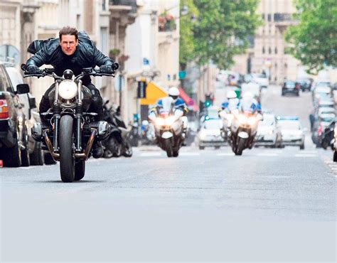 6, cruise is back in the saddle of a bmw 6 motorcycles ridden by Tom Cruise