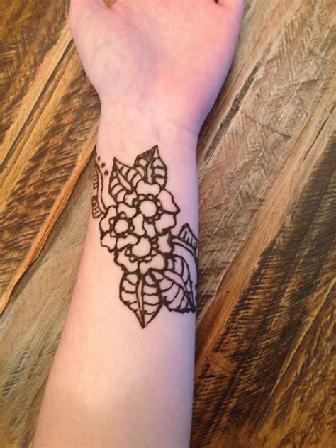 Simple wrist henna tattoo | Henna tattoo wrist, Wrist tattoos, Wrist tattoos for guys