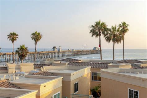 View Of The Pier And Palm Trees On The Beach Of Oceanside California