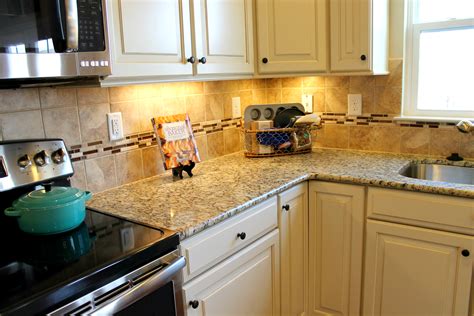 What kitchen backsplash materials are best for white cabinets? Friendly Feature: Santa Cecilia Granite | White granite ...