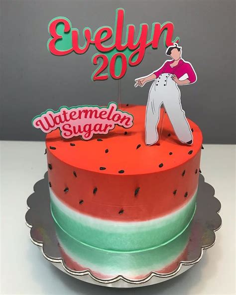 A Watermelon Cake With The Number Twenty On It And A Sign That Says
