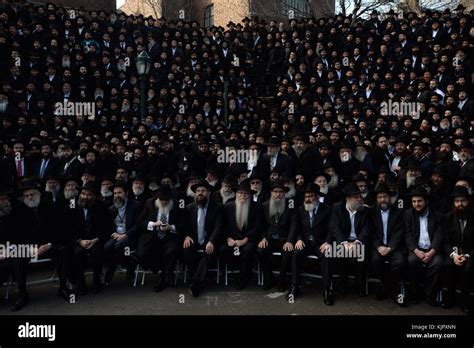 Clad in traditional hasidic clothing hi-res stock photography and