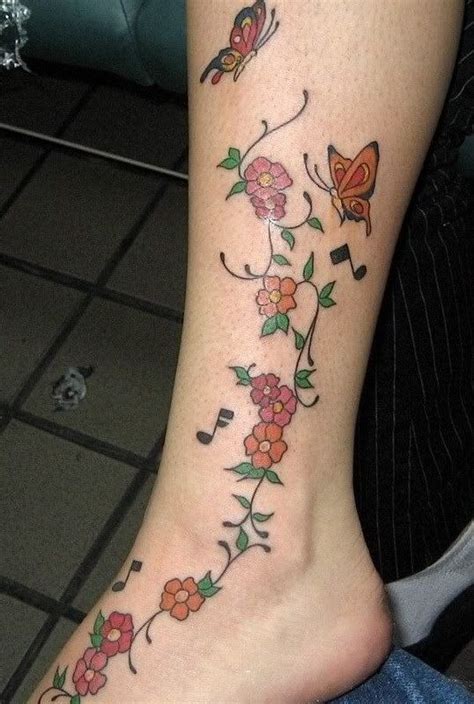 Small flower tattoos on the shoulder. Google Image Result for http://www.tattoostime.com/images ...
