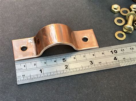 A cushion covering the clamp reduces vibration and wear from clamp edges. Copper Pipe Clamp 25mm Solid Copper Pipe Fitting
