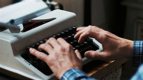 Typing On A Vintage Typewriter Machine Writing A Love Letter By The