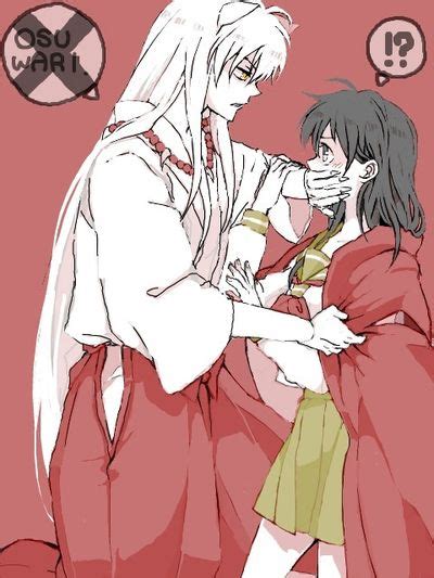 inuyasha x kagome hes giving her his red coat and she looks like shes about to protest and hes