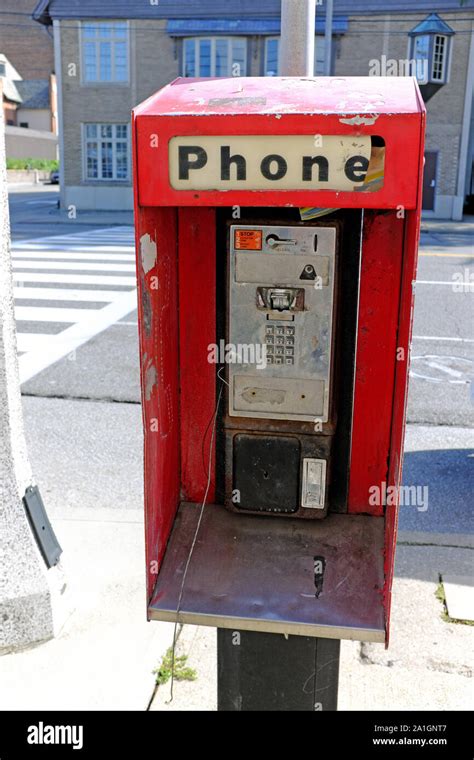 Red Coin Operated Public Pay Phone On Carnegie Avenue In Cleveland