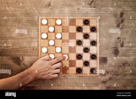 Man Starting Play Draughts Checkers Board Game Stock Photo Alamy