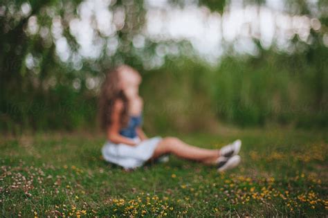 Teen Girl Relaxing On A Meadow By Stocksy Contributor Paff Stocksy