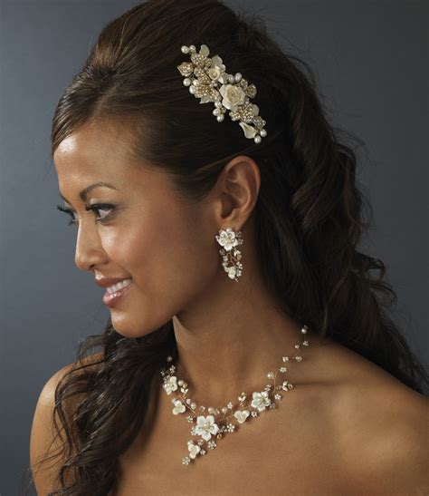 Bridal headpieces are a must have accessory that completes the bridal trousseau. Precious Gold Flower Headpiece Comb w/ Ivory Pearls 8278
