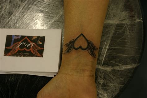 Japanese dragon tattoos are quite popular; Pink(singer) heart with wings tattoo | Tattooed by Johnny ...