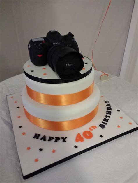 Kamara swiss roll cake 50g. Camera cake - cake by Catherine - CakesDecor