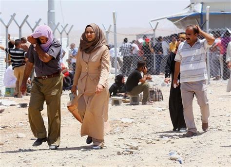 Hundreds Of Thousands Of Iraqis Flee Mosul After Militants Take Over