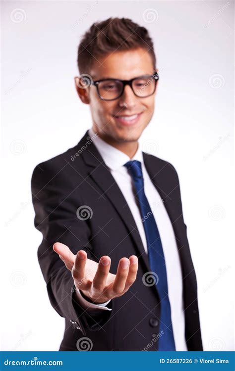 Business Man Holding Something On His Hand Stock Photography