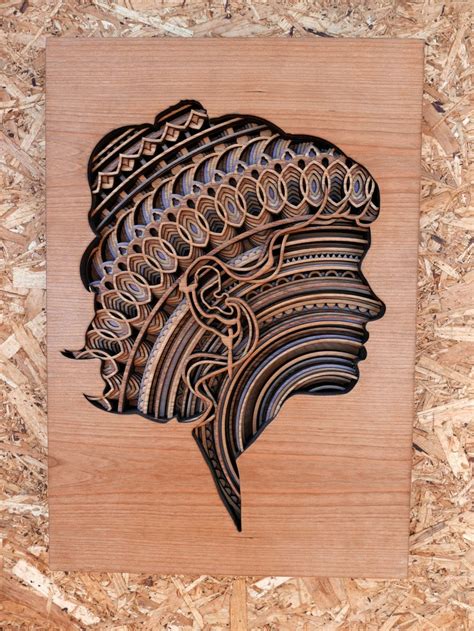 Layers Of Intricate Patterns Are Featured In Mesmerising Laser Cut Wood