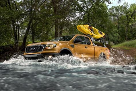 2019 Ford Ranger Crossing Street With Kayak On Optional Bed Mounted