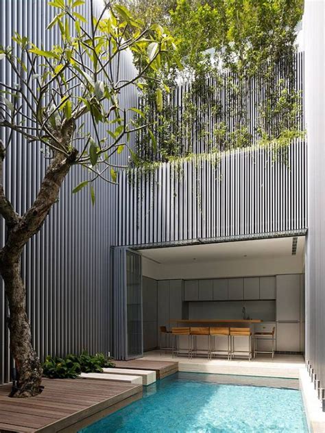 Plenty of handcrafted woodwork including exposed ceiling beams. Modern Minimalist House Design