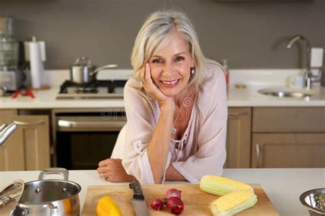 Mature Woman Kitchen Fresh Produce Stock Photos Free And Royalty Free