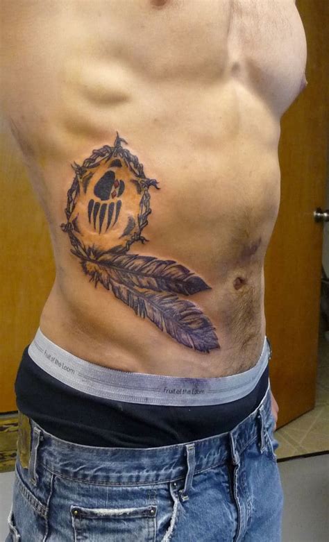 Are you looking for rib tattoos for guys, if so then you have come to the right site. Creative Rib Cage Tattoo Idea For Guy - CreativeFan